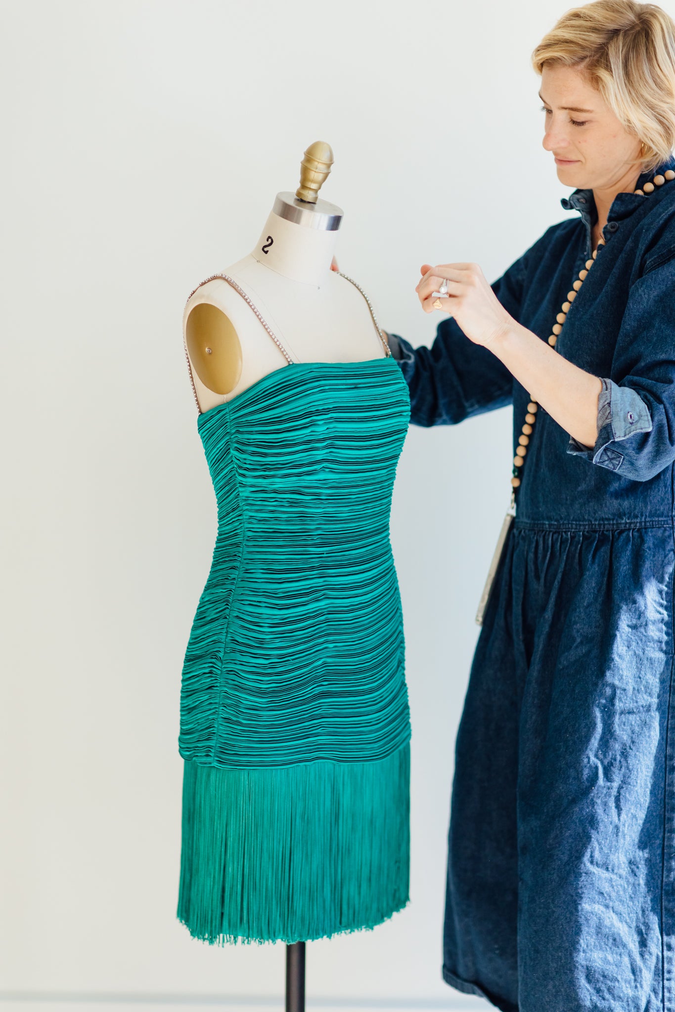 Morton Myles Green Accordion Fringe Dress